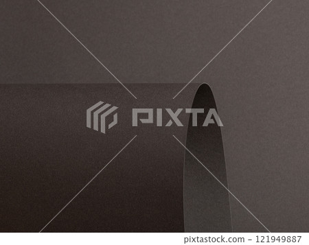 Charcoal gray paper background with curved, matte surfaces and subtle textured shadows. Bold dark Charcoal gray paper background with curved, matte surfaces and subtle textured shadows. Bold dark 121949887