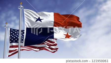 National flags of Panama and the The US waving in the wind on a clear day National flags of Panama and the The US waving in the wind on a clear day 121950061
