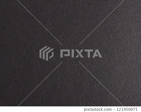 Charcoal black paper background with a smooth, grainy texture. Bold dark tones and a matte, polished 121950071