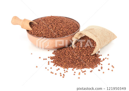 Raw buckwheat on white Raw buckwheat on white 121950349