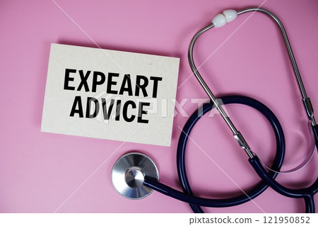 Expert Advice text with stethoscope on pink background, Healthy and wellness concept Expert Advice text with stethoscope on pink background, Healthy and wellness concept 121950852
