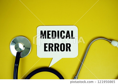 Medical Error text with stethoscope on yellow background, Healthy and wellness concept Medical Error text with stethoscope on yellow background, Healthy and wellness concept 121950865