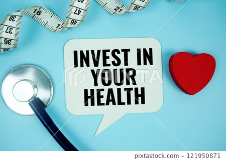 Invest In Your Health text on speech bubble with Red heart , measure tape and stethoscope on blue background, Healthy concept 121950871