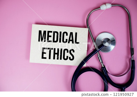 Medical Ethics text with Stethoscope on pink background, Healthy and wellness concept Medical Ethics text with Stethoscope on pink background, Healthy and wellness concept 121950927
