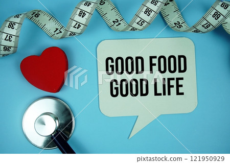 Good Food, Good Life text on speech bubble with Red heart , measure tape and stethoscope on blue background, Healthy concept 121950929