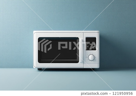 Modern white microwave oven sitting on kitchen counter 121950956