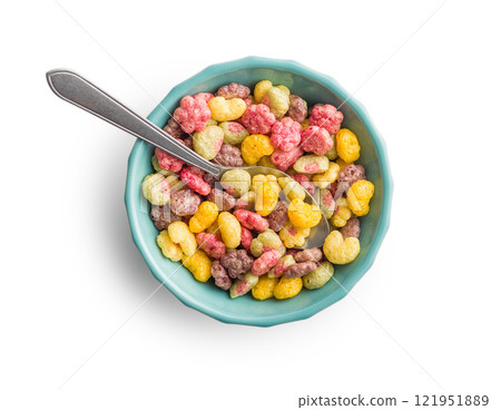 Colorful breakfast cereals in the shape of various fruit in bowl isolated on white background. Colorful breakfast cereals in the shape of various fruit in bowl isolated on white background. 121951889