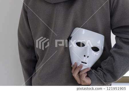 Man hiding a white mask behind his back (Japanese, 30s, faceless) 121951905