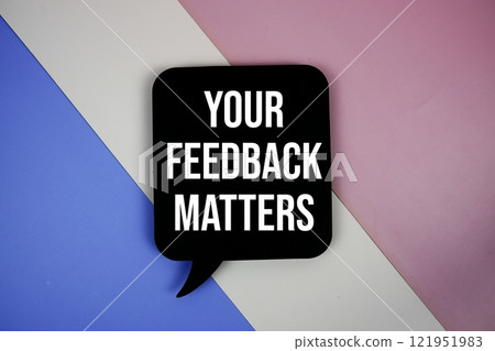 Your Feedback Matters text on speech bubble top view on purple geometric background Your Feedback Matters text on speech bubble top view on purple geometric background 121951983