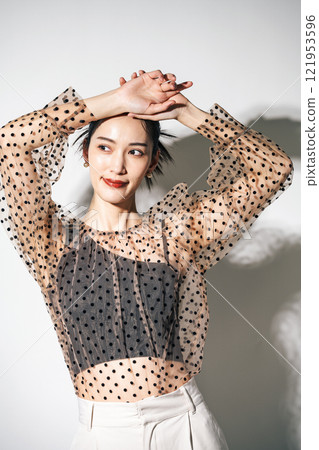 Portrait of a woman in see-through clothing Portrait of a woman in see-through clothing 121953596