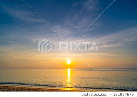 Colorful sunset or sunrise light over ocean in Patong Beach Phuket Thailand Colorful sunset or sunrise light over ocean in Patong Beach Phuket Thailand 121954676