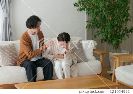 A sick wife and a worried husband A sick wife and a worried husband 121954951