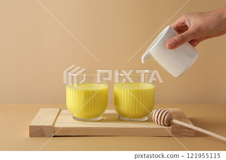 Moon or turmeric milk, concept of tasty drink Moon or turmeric milk, concept of tasty drink 121955115