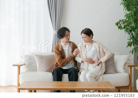 A sick wife and a worried husband A sick wife and a worried husband 121955183