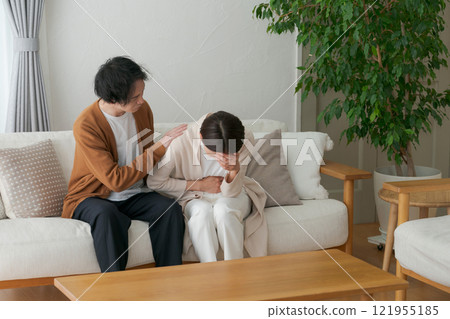 A sick wife and a worried husband A sick wife and a worried husband 121955185