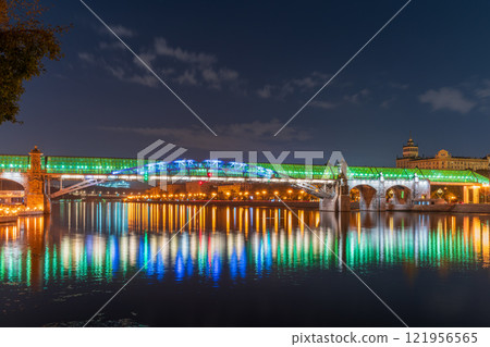 Pushkinskiy bridge with night illumination. Bridge to Gorky Park. Pushkinskiy bridge with night illumination. Bridge to Gorky Park. 121956565