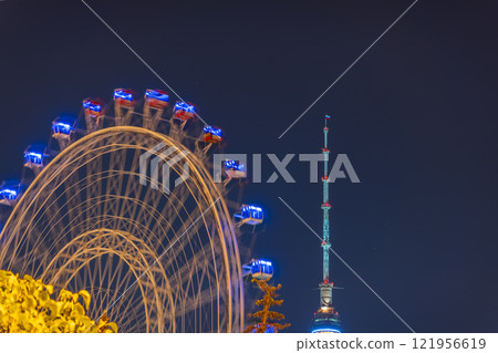 View of the 'Sun of Moscow' Ferris wheel located in VDNKh park in Moscow 121956619