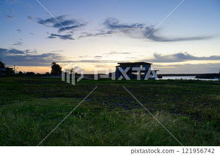 Early morning sky and grassland Early morning sky and grassland 121956742