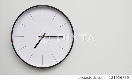 Wall Clock Showing 19.15/07.15 O'Clock on White Wooden Surface - Perfect for Time Management and Scheduling Concepts Wall Clock Showing 19.15/07.15 O'Clock on White Wooden Surface - Perfect for Time Management and Scheduling Concepts 121956789