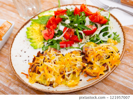 French style meat with potatoes and vegetable salad French style meat with potatoes and vegetable salad 121957007