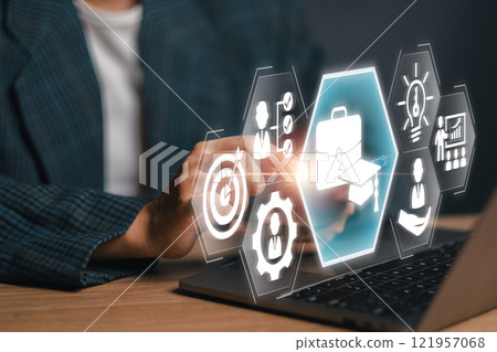 Digital Internship Concept with Futuristic Icons and Business Elements on Laptop Screen 121957068
