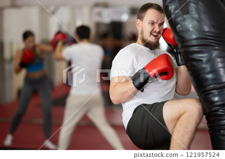 Man in Muay Thai training Man in Muay Thai training 121957524