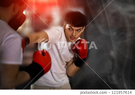 Guy sparring in boxing Guy sparring in boxing 121957614