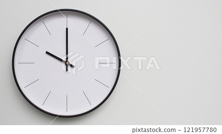 Wall Clock Showing 10.00/22.00 O'Clock on White Wooden Surface - Perfect for Time Management and Scheduling Concepts Wall Clock Showing 10.00/22.00 O'Clock on White Wooden Surface - Perfect for Time Management and Scheduling Concepts 121957780