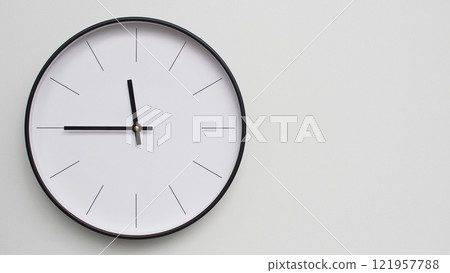 Wall Clock Showing 23.45/11.45O'Clock on White Wooden Surface - Perfect for Time Management and Scheduling Concepts Wall Clock Showing 23.45/11.45O'Clock on White Wooden Surface - Perfect for Time Management and Scheduling Concepts 121957788