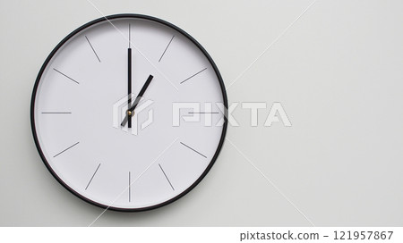 Wall Clock Showing 13.00/01.00 O'Clock on White Wooden Surface - Perfect for Time Management and Scheduling Concepts 121957867
