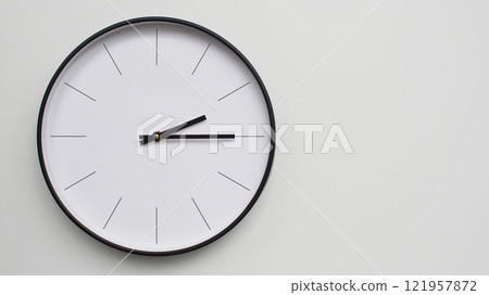 Wall Clock Showing 14.15/02.15 O'Clock on White Wooden Surface - Perfect for Time Management and Scheduling Concepts Wall Clock Showing 14.15/02.15 O'Clock on White Wooden Surface - Perfect for Time Management and Scheduling Concepts 121957872