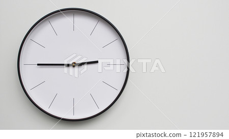 Wall Clock Showing 14.45/02.45 O'Clock on White Wooden Surface - Perfect for Time Management and Scheduling Concepts 121957894