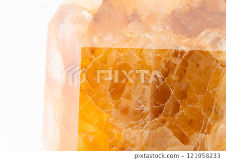 Close-up of a beautiful gold-colored iron-containing quartz crystal gemstone Close-up of a beautiful gold-colored iron-containing quartz crystal gemstone 121958233