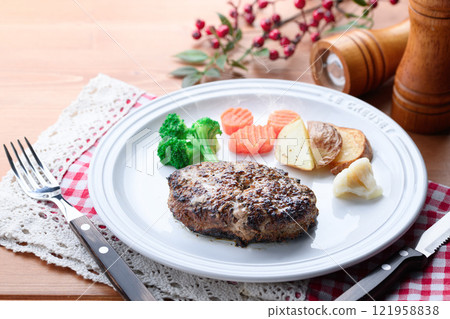 Hamburg steak (before pouring demi-glace sauce) 121958838