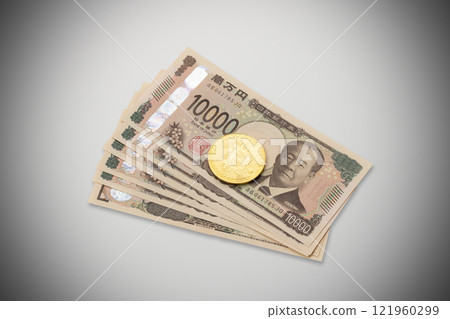 比特幣和 10,000 日元鈔票圖像照片 121960299