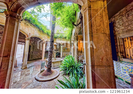 Inner courtyard of the Cathedral of the Holy Cross. Inner courtyard of the Cathedral of the Holy Cross. 121961234
