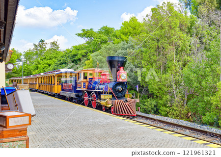 Ride train in an amusement park. 121961321