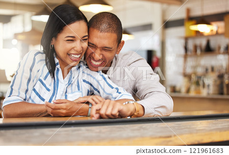 Couple laughing at funny joke at restaurant, boyfriend and girlfriend bonding with smile on romantic date and celebrating anniversary at coffee shop. Husband and wife showing love, having fun at cafe Couple laughing at funny joke at restaurant, boyfriend and girlfriend bonding with smile on romantic date and celebrating anniversary at coffee shop. Husband and wife showing love, having fun at cafe 121961683