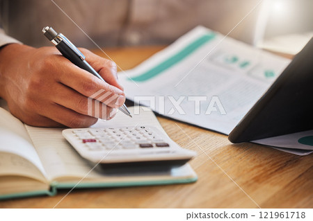 Accountant or financial advisor calculating the tax, expenses or budget for a business in an office. Closeup of male investment consultant hands working and writing company finance statement Accountant or financial advisor calculating the tax, expenses or budget for a business in an office. Closeup of male investment consultant hands working and writing company finance statement 121961718