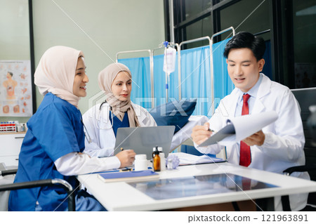 Medical, meeting and laptop for team in discussion, brainstorming and planning. Doctor, nurse on desk 121963891