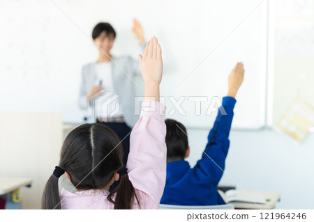 Elementary school students taking lessons in a classroom 121964246