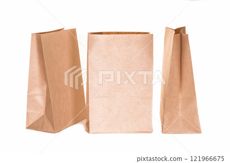 Various kraft paper bags isolated on white background 121966675