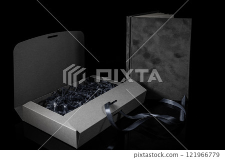 Best gift for men. Man gift concept. Grey notebook with Grey gift box on black background. Copy space. Valentine's day, wedding, birthday and special occasion gift concept. Copy space for text. 121966779