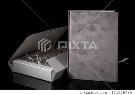 Best gift for men. Man gift concept. Pink notebook with Pink gift box on black background. Copy space text. Valentine's day, wedding, birthday and special occasion gift concept. Copy space for text. Best gift for men. Man gift concept. Pink notebook with Pink gift box on black background. Copy space text. Valentine's day, wedding, birthday and special occasion gift concept. Copy space for text. 121966789