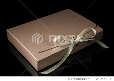 Man gift concept. gift box with luxury bow on dark background. Horizontal with copy space. 121966805