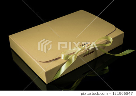 Man gift concept. gift box with luxury bow on dark background. Horizontal with copy space. Man gift concept. gift box with luxury bow on dark background. Horizontal with copy space. 121966847
