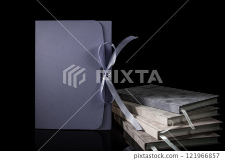 Best gift for men. Man gift concept. Various notebooks with craft gift box black background. Copy space text. Valentine's day, wedding, birthday and special occasion gift concept. Copy space for text. 121966857