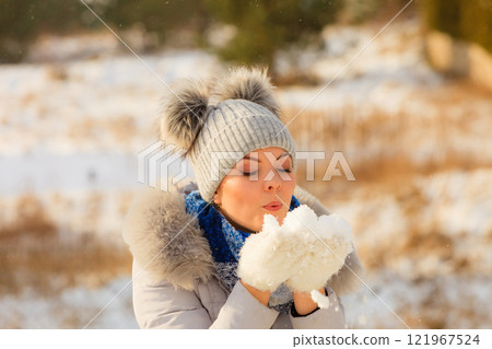 Female wearing warm outfit during winter Female wearing warm outfit during winter 121967524
