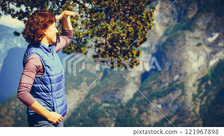 Tourist on mountains top, Norway 121967898