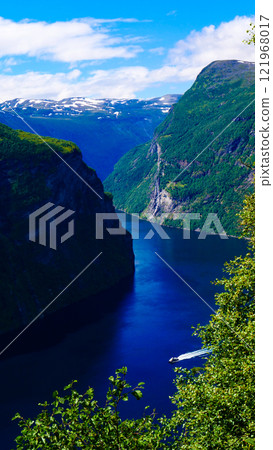 Fjord Geirangerfjord with ferry boat, Norway. Fjord Geirangerfjord with ferry boat, Norway. 121968017